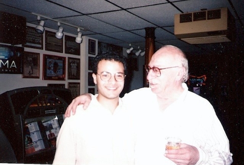 Two men standing together 
